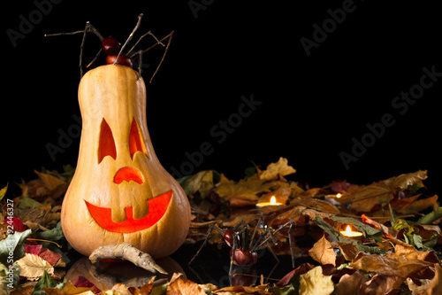 Smiling pumpkin halloween with spider photo