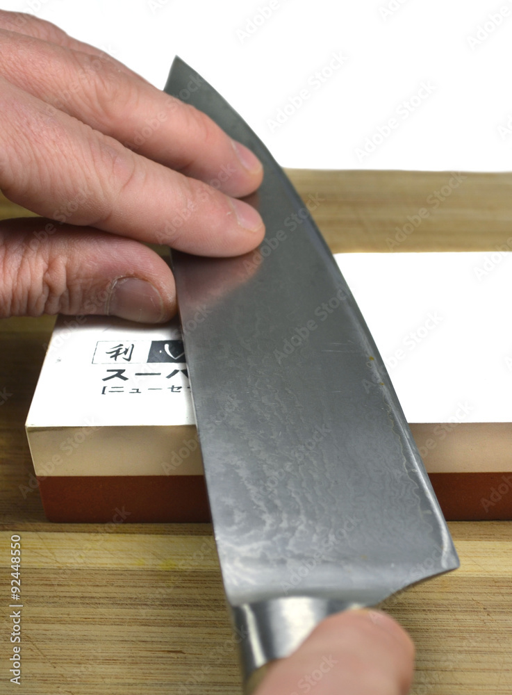 Damast-Messer schärfen - Chefkoch Stock-Foto | Adobe Stock