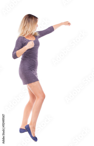 skinny woman funny fights waving his arms and legs