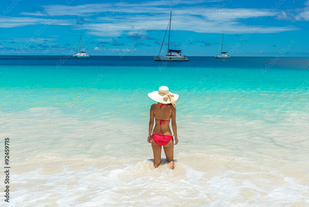 Girl at Anse Lazio - Paradise beach in Seychelles, tropical island Praslin Girl at Anse Lazio - Paradise beach in Seychelles, tropical island Praslin