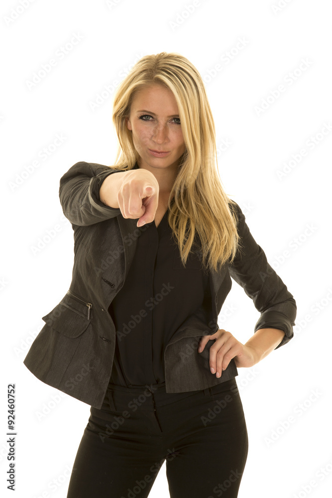 blond woman in black business attire point serious blond woman in black business attire point serious