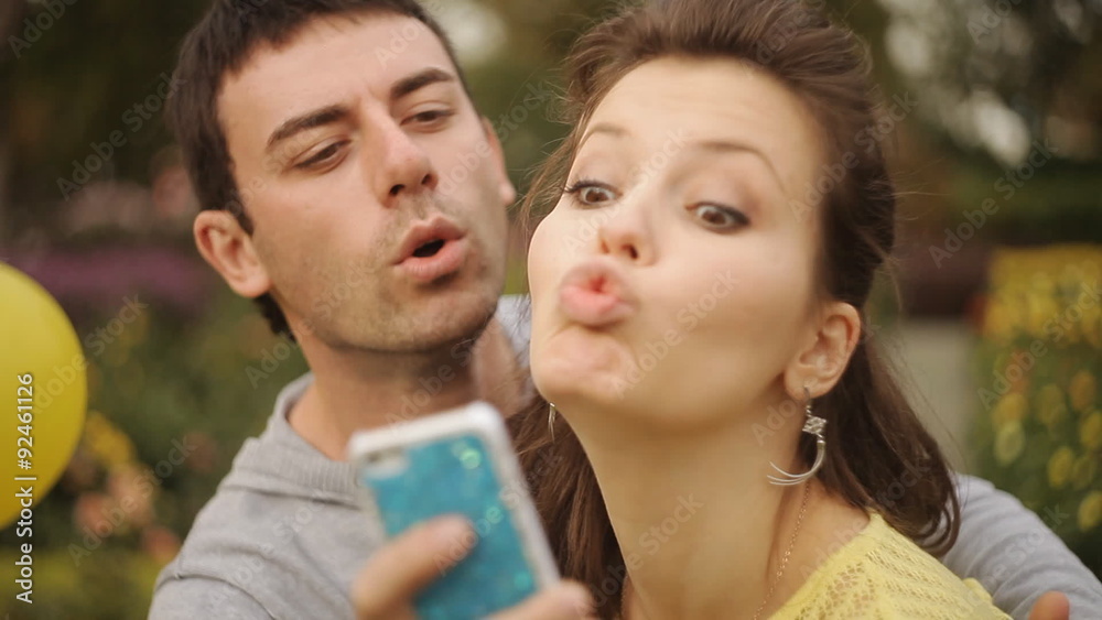couple relieves himself on the phone and laughing couple relieves himself on the phone and laughing
