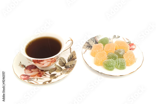cup of tea and fruit candies