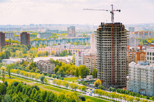 Construction of houses in residential area in Minsk, Belarus photo