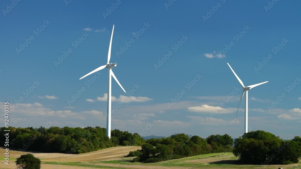 Wind turbine energy farm in the countryside, France Wind turbine energy farm in the countryside, France