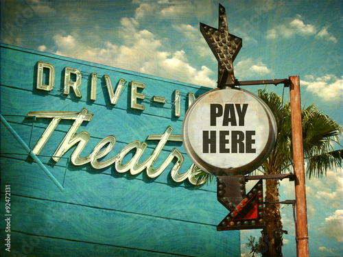 Εκτύπωση καμβά aged and worn vintage photo of pay here sign at drive in theater