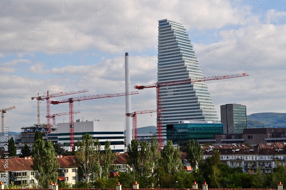 Hausdächer in Basel mit Baukranen, Hochhäuser und Roche Tower Stock Photo |  Adobe Stock