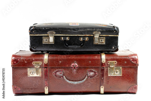 Vintage suitcases on white background