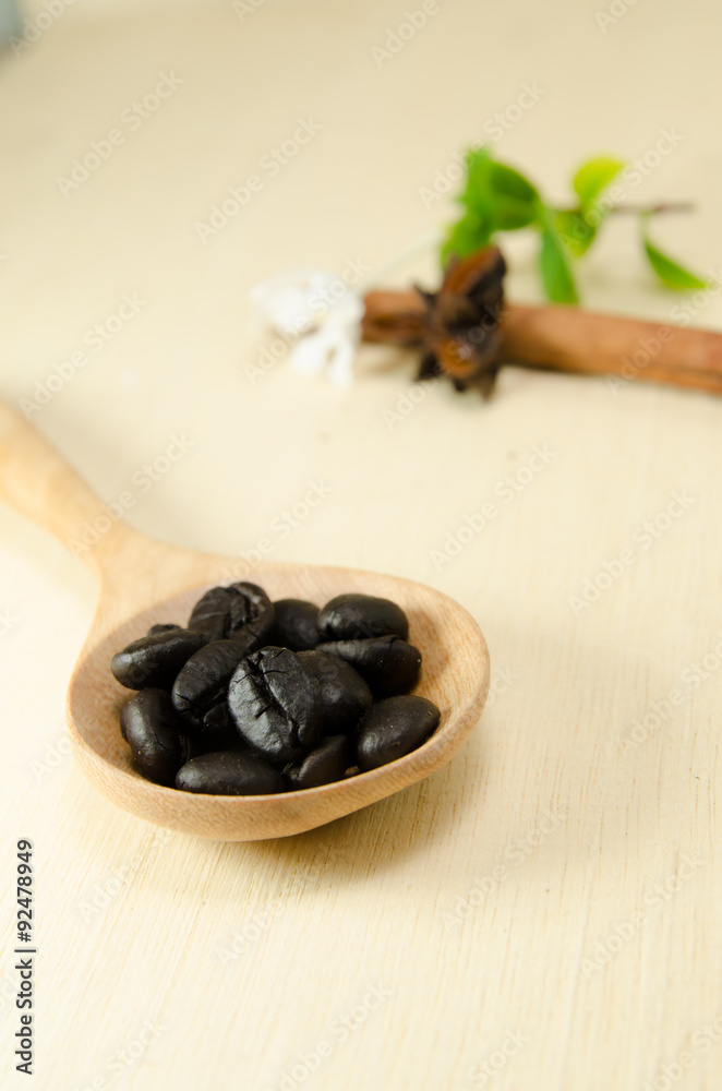 bean on wooden spoon on wood board background bean on wooden spoon on wood board background