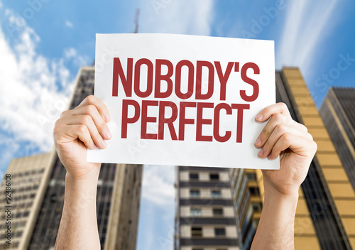 Wallpaper Mural Nobody's Perfect placard with cityscape background Torontodigital.ca