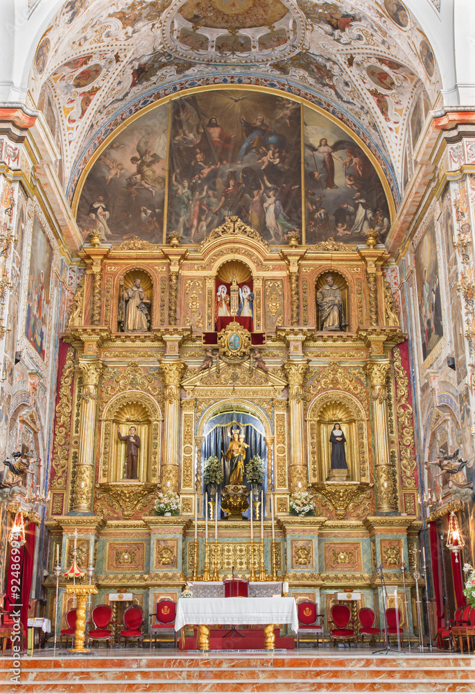 Seville - altar of baroque church Basilica del Maria Auxiliadora.
