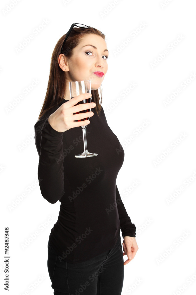 Woman in her 20s standing wearing a black sweater with glasses on her head, holding a wine glass smiling towards camera. White background. Woman in her 20s standing wearing a black sweater with glasses on her head, holding a wine glass smiling towards camera. White background.