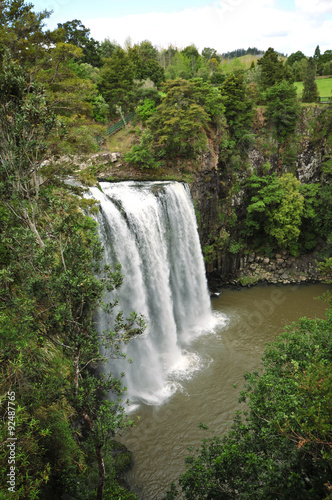 Whangarei falls from an elevated position on a cloudy day.
