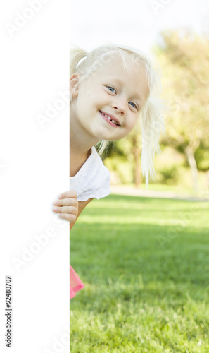 Cute Little Girl Holding Wh...
