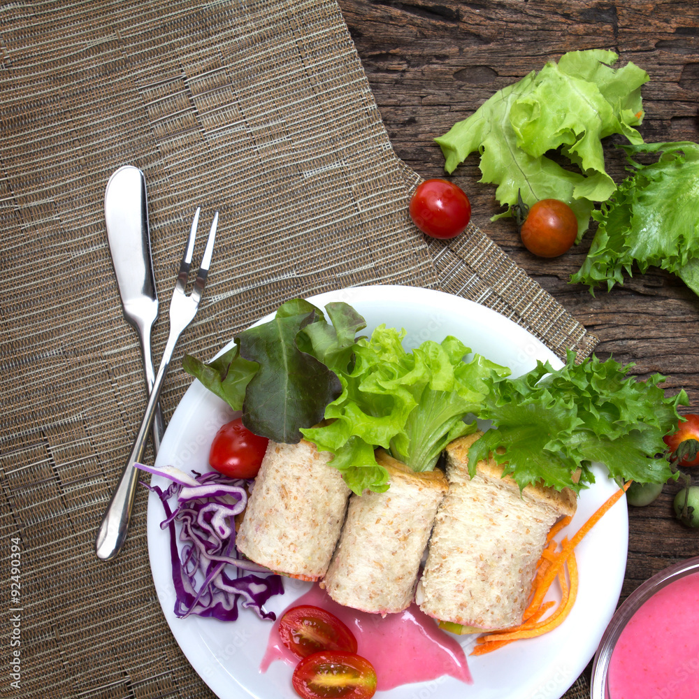 fresh whole wheat bread wraps with vegetables and fruit on the p fresh whole wheat bread wraps with vegetables and fruit on the p