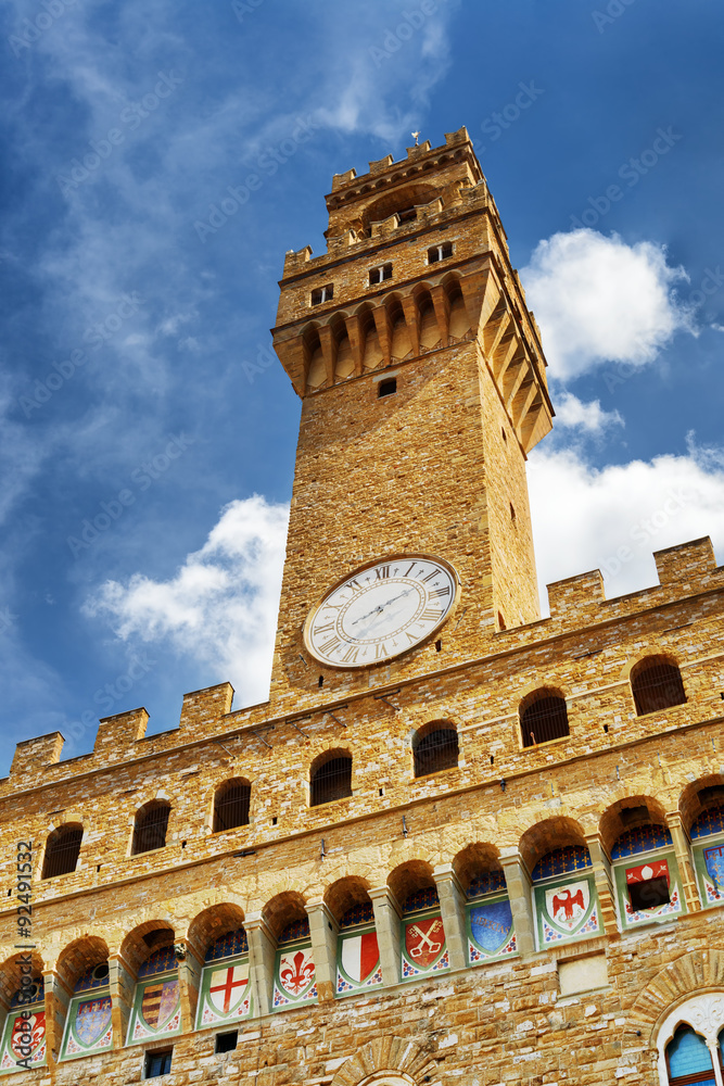 Bell tower and clock of the Palazzo Vecchio in Florence, Italy