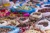 Beautiful vivid oriental market with bags full of various spices