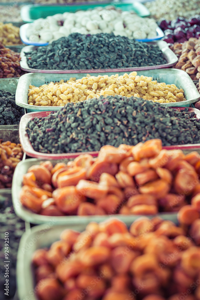 Dry fruits and spices like cashews, raisins, cloves, anise, etc.