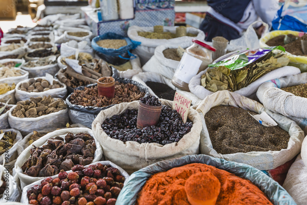 Fototapeta premium Beautiful vivid oriental market with bags full of various spices