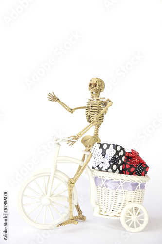 Stock Photo:. Human skeleton Cycling on white background