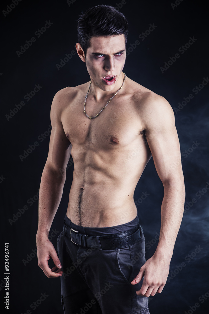 Fototapeta premium Young Vampire Man Shirtless, Gesturing to Camera