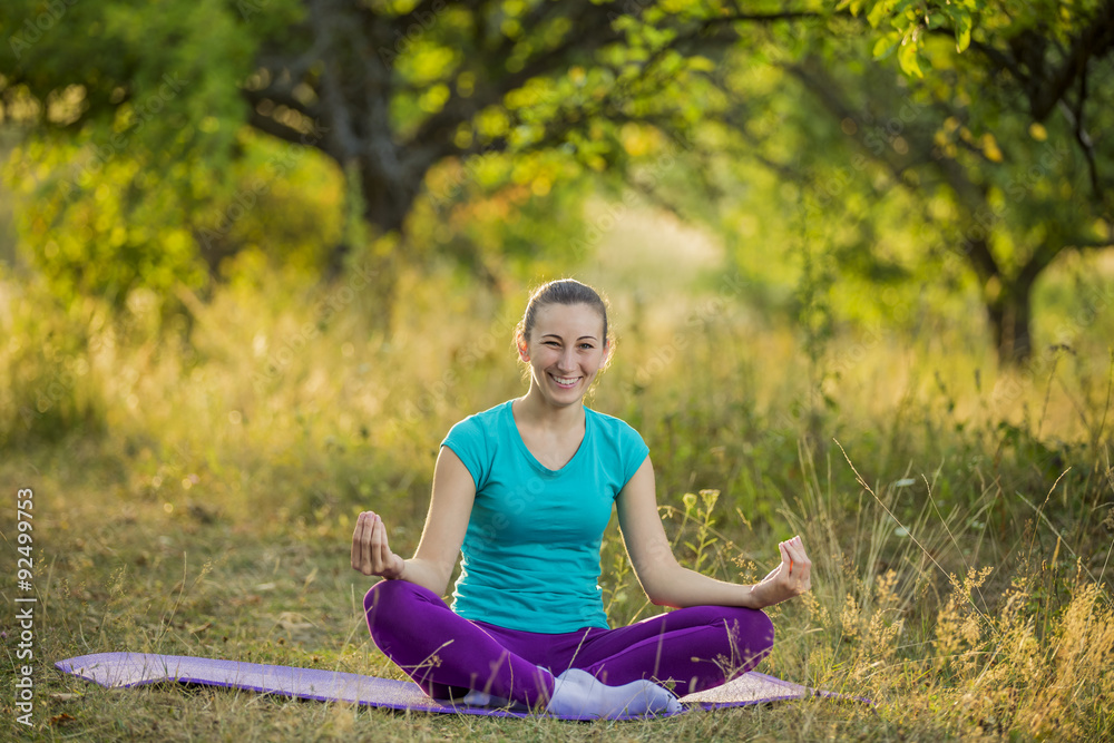 woman in lotus position