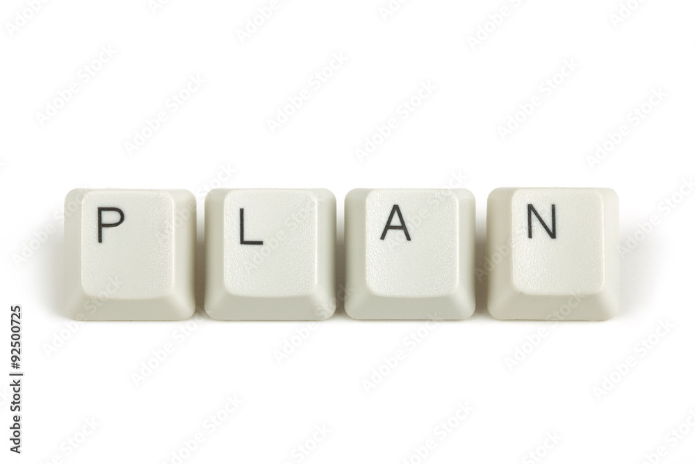 plan from scattered keyboard keys on white plan from scattered keyboard keys on white