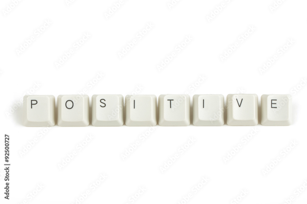 positive from scattered keyboard keys on white positive from scattered keyboard keys on white