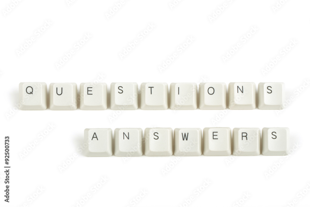 questions answers from scattered keyboard keys on white