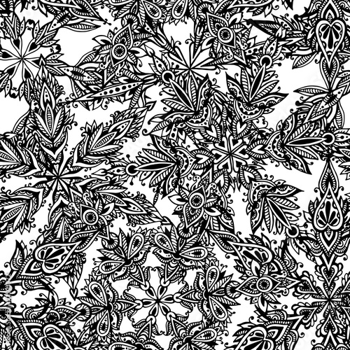 Seamless vector pattern with hand drawn graphic doodle snowflake