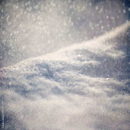 Winter background - Abstract bokeh lights and snowdrift