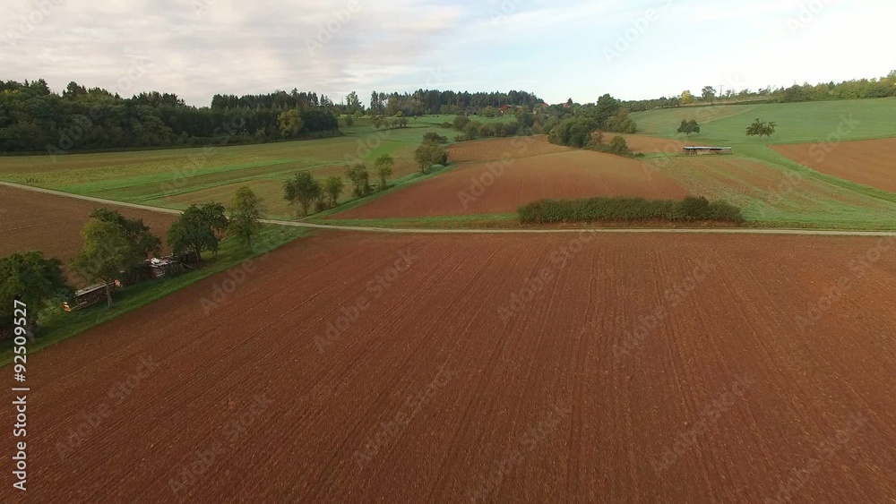 Aerial view of fields and forests at sunrise Aerial view of fields and forests at sunrise