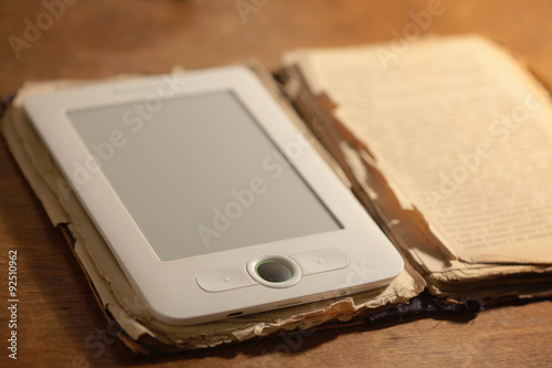 Modern e-book and old paper book