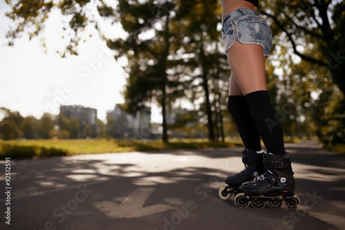 Sexy female legs in roller skates
