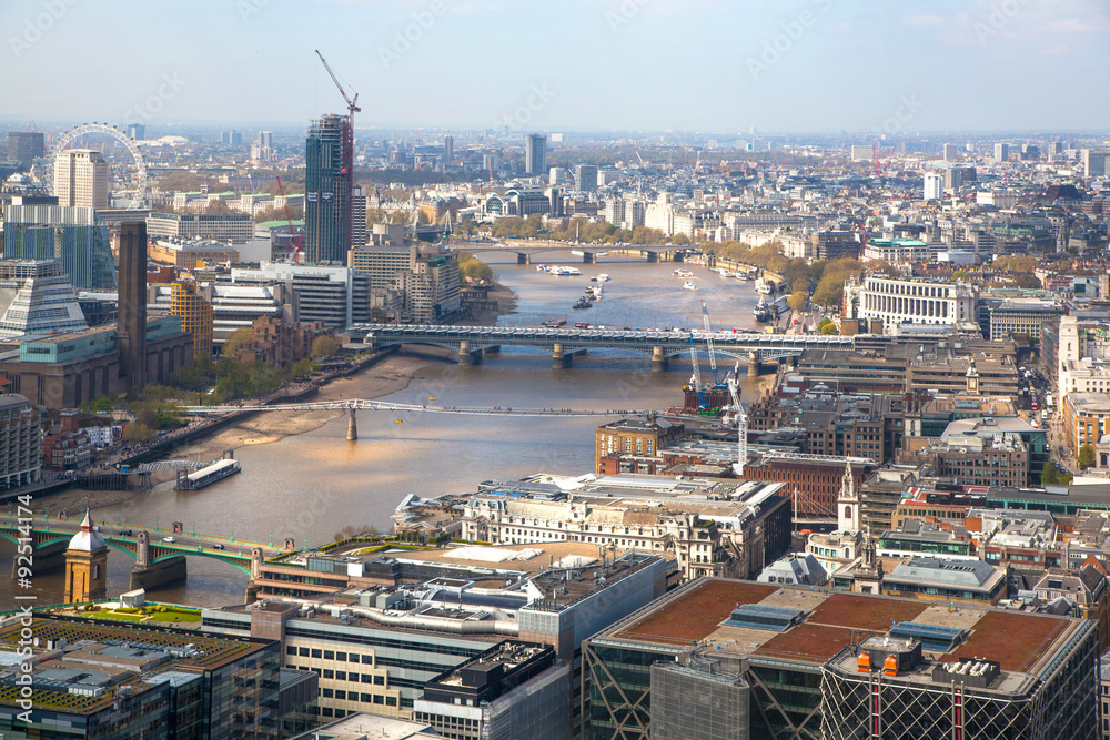 LONDON, UK - SEPTEMBER 17, 2015: City of London aerial view, Westminster side of city and bridges. London panorama form 32 floor of Walkie-Talkie building