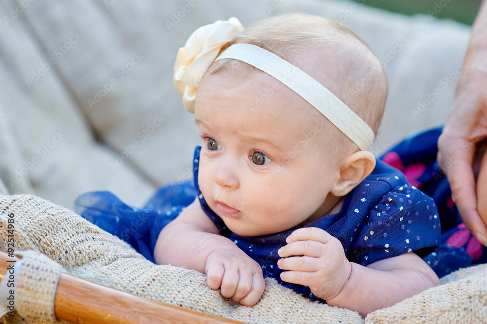 happy little girl sitting on the couch happy little girl sitting on the couch
