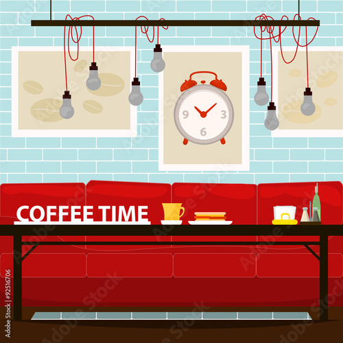 Stylish cafe interior with blue tile wall and bright red divan