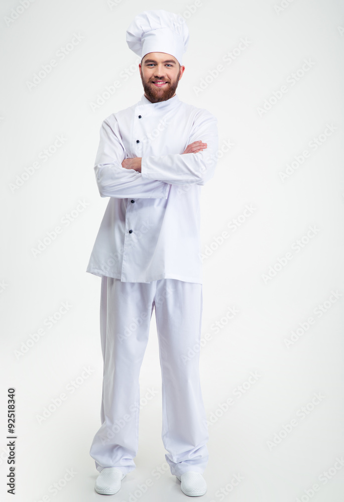 Smiling male chef cook standing with arms folded