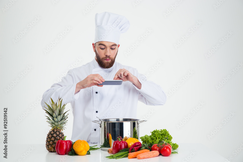 Male chef cook making photo of food Male chef cook making photo of food