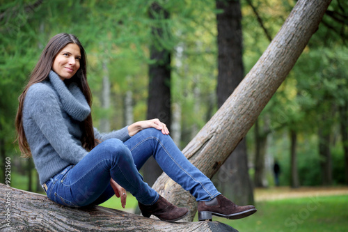 Beautiful brunette woman outdoors © destillat