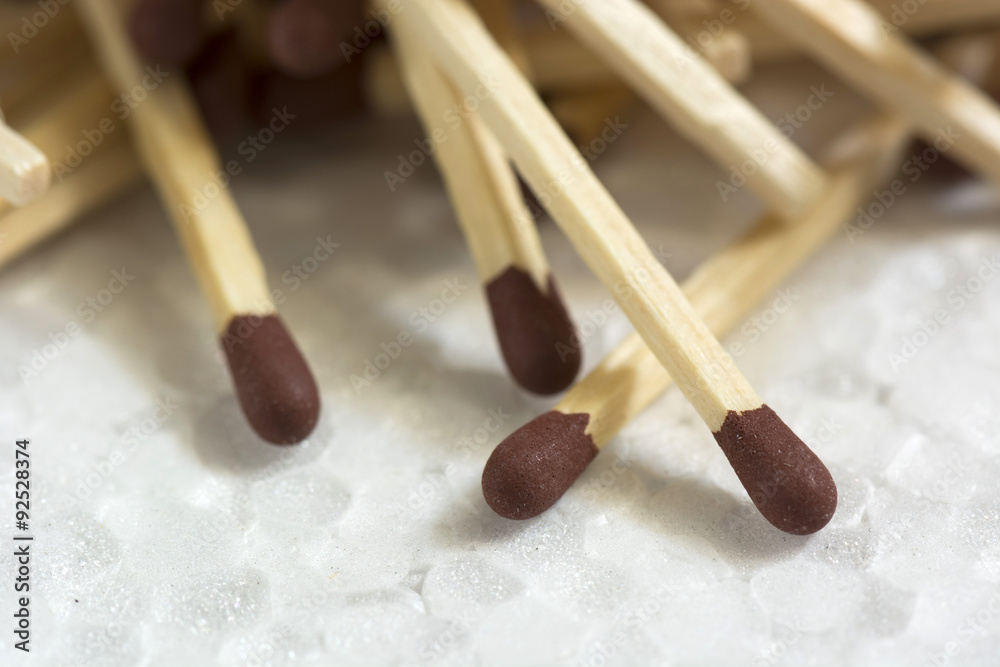 matches lying on each other on a white background in a macro view matches lying on each other on a white background in a macro view