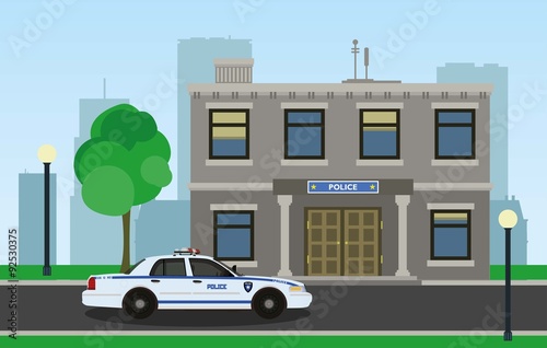 The police car opposite the of the police station.