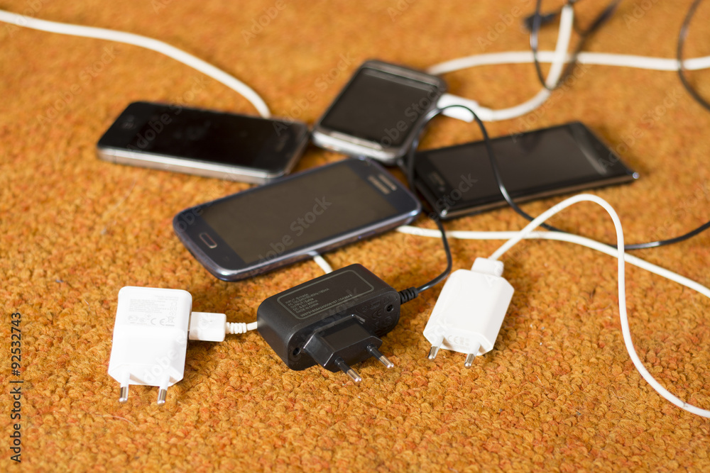 Phone Chargers on the floor Phone Chargers on the floor