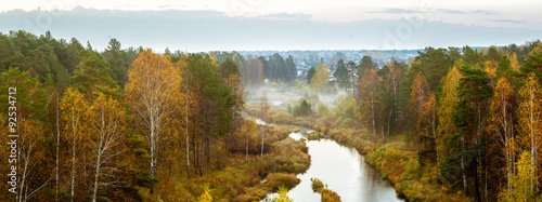 Осенний пейзаж туманным утром в лесу и рекой, Россия, Урал #92534712