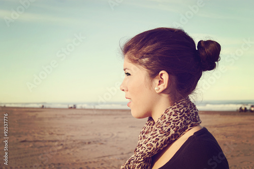 A teenager is looking at the beach in a nice spring day in Mar del Plata, Argentina