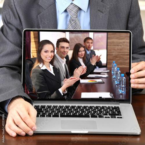Businessman attending video conference