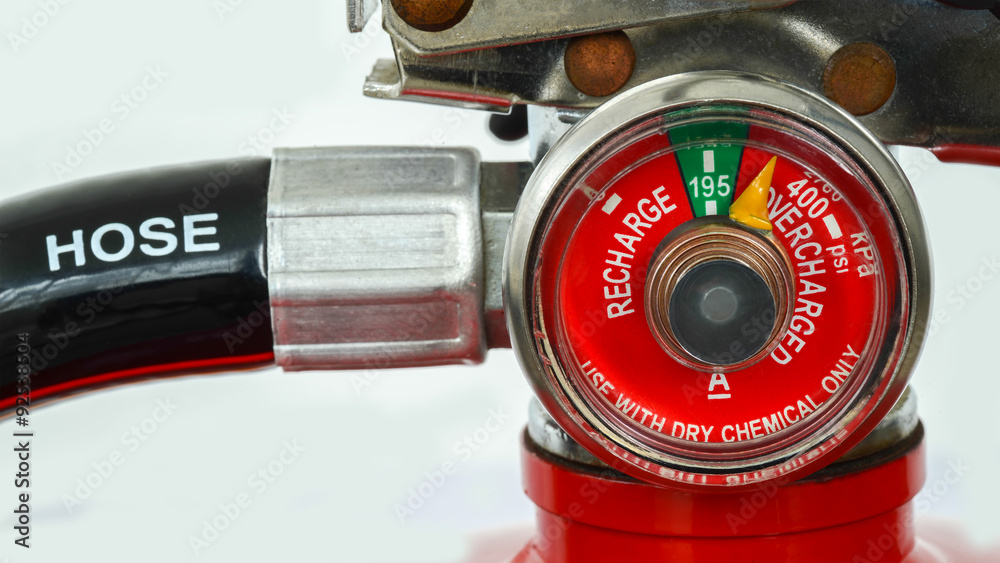 Detail of fire extinguisher pressure gauge indicator showing level of ...