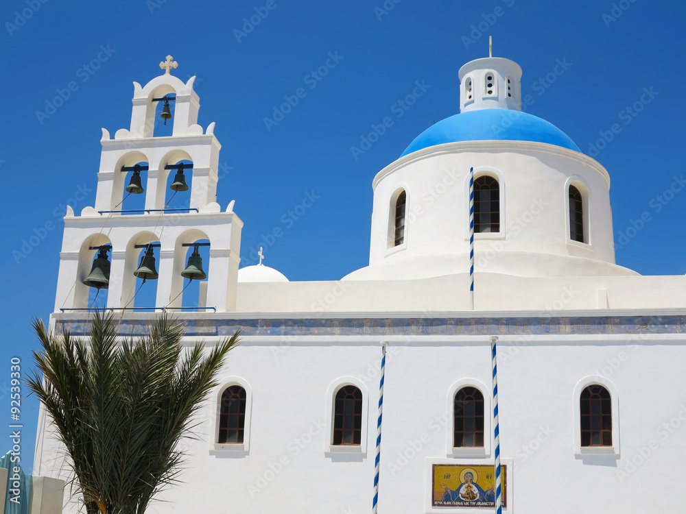 beautiful typical blue dome church and blue sky on Santorini, Gr