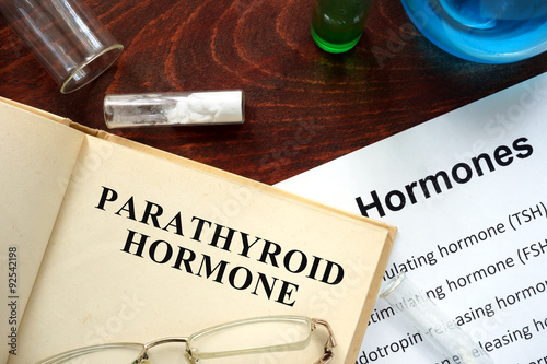  parathyroid hormone (PTH)  written on book. Test tubes and hormones list.