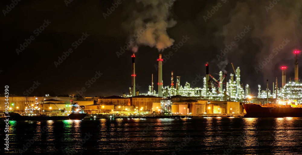 Oil refinery plant at night